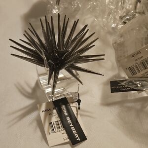 Kim Seybert Metallic Silver Starburst Accent Napkin Rings. Set Of 4